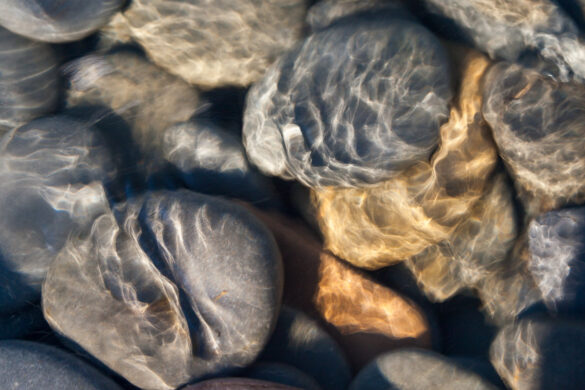 Abstract of pebbles on the sea floor