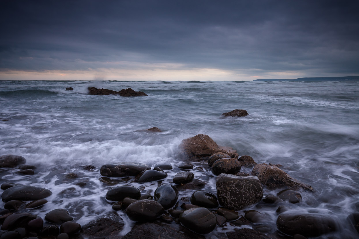 The sea crashes against the rocks at Westward Ho in Devon